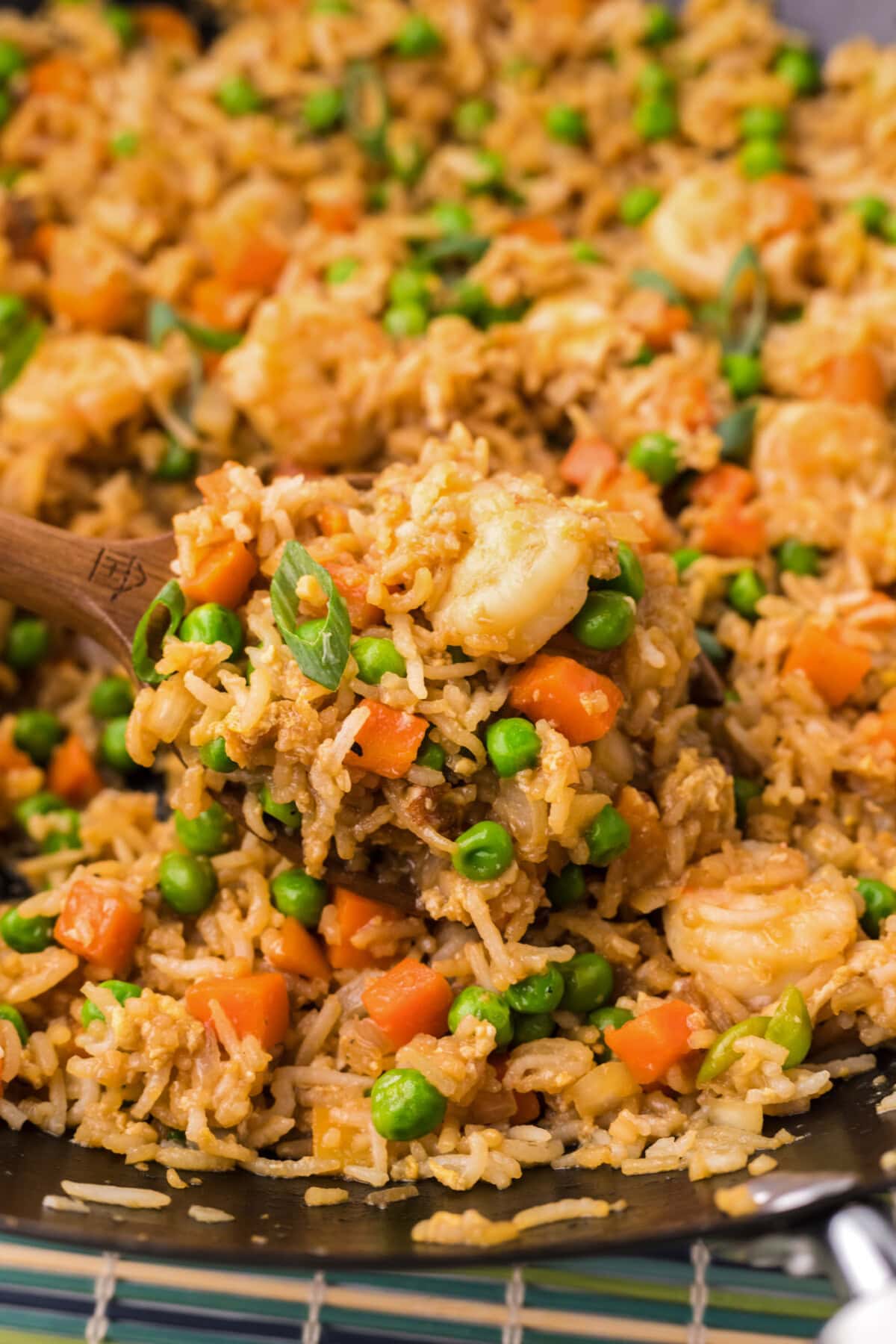 Close up photo of a spoonful of Shrimp Fried Rice