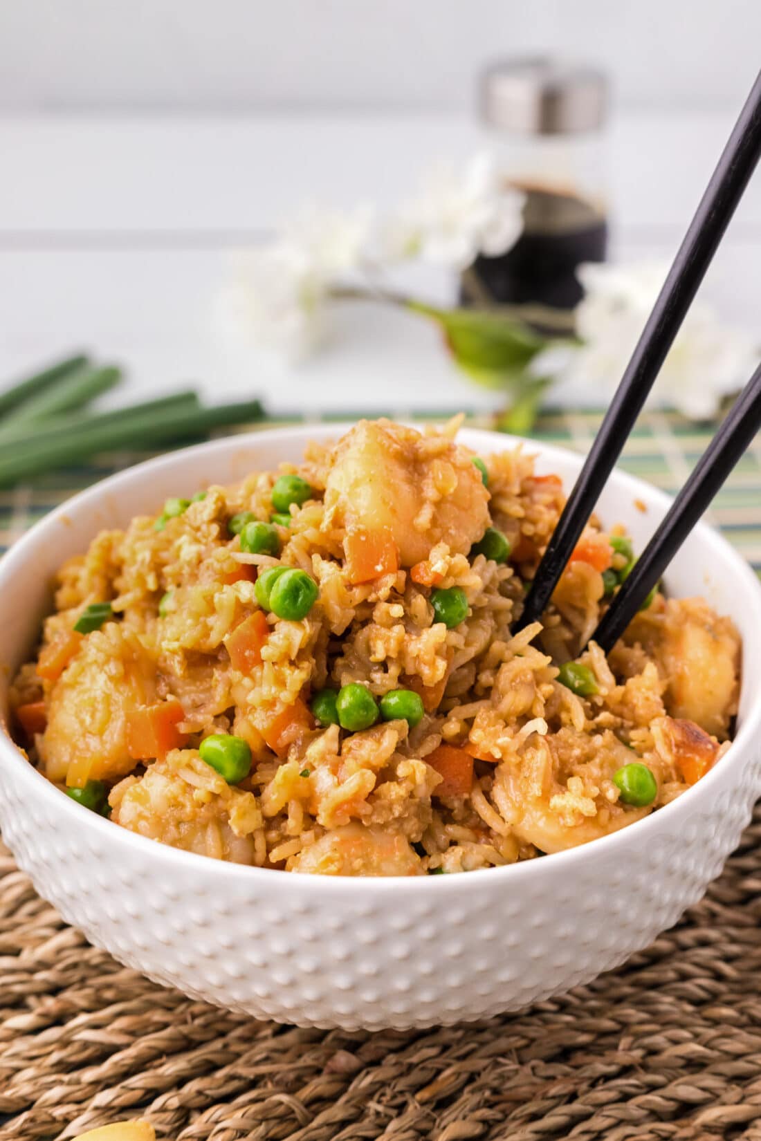 Bowl of Shrimp Fried Rice with chopsticks in it