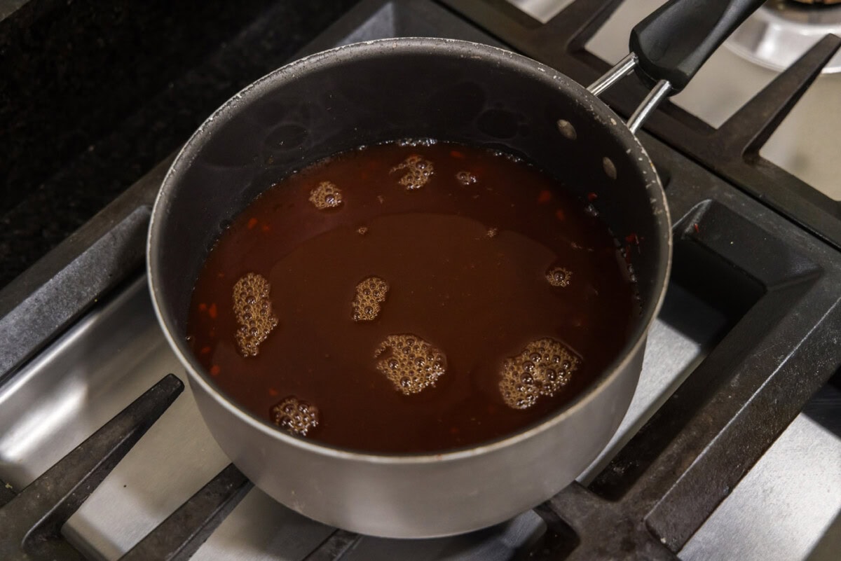 sweet and sour sauce in a saucepan