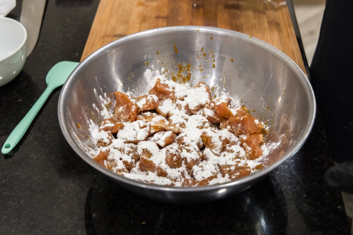 pork cubes with flour sprinkled on top