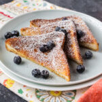 Three slices of Air Fryer French Toast on a plate
