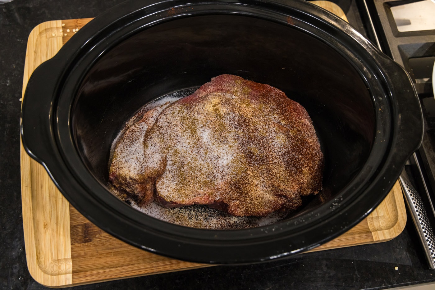 seasoned chuck roast in slow cooker crock