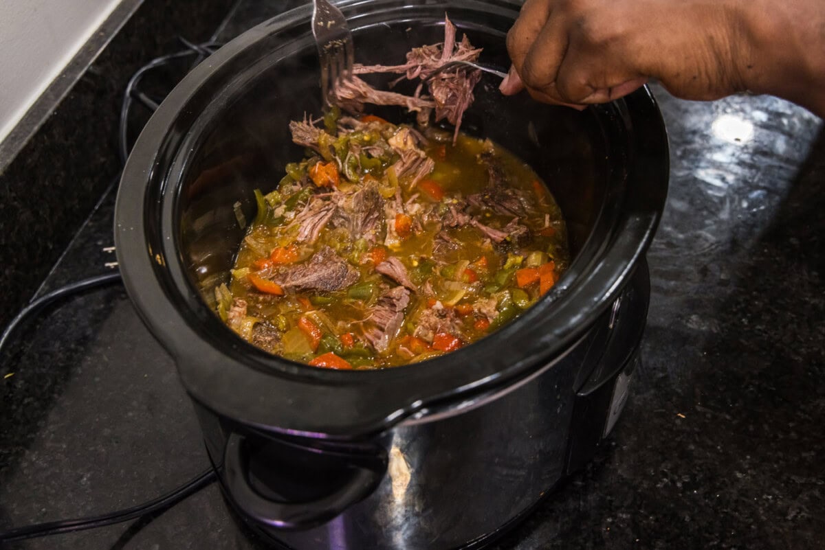 shredding chuck roast in crockpot for beef carnitas