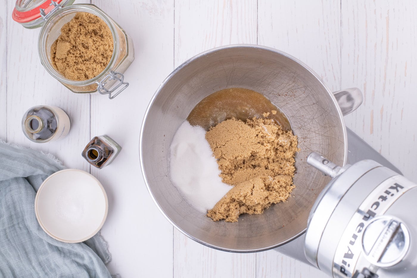 brown sugar, granulated sugar, and browned butter in a mixing bowl