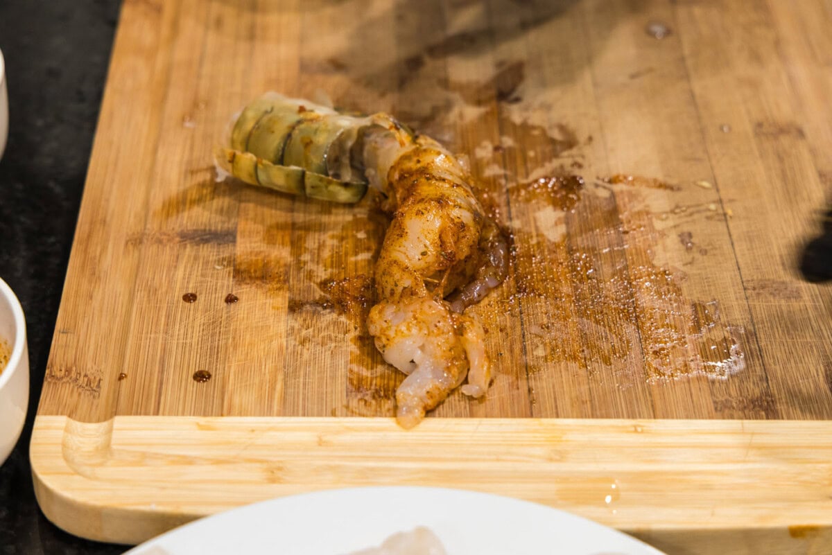 seasoned colossal shrimp on cutting board