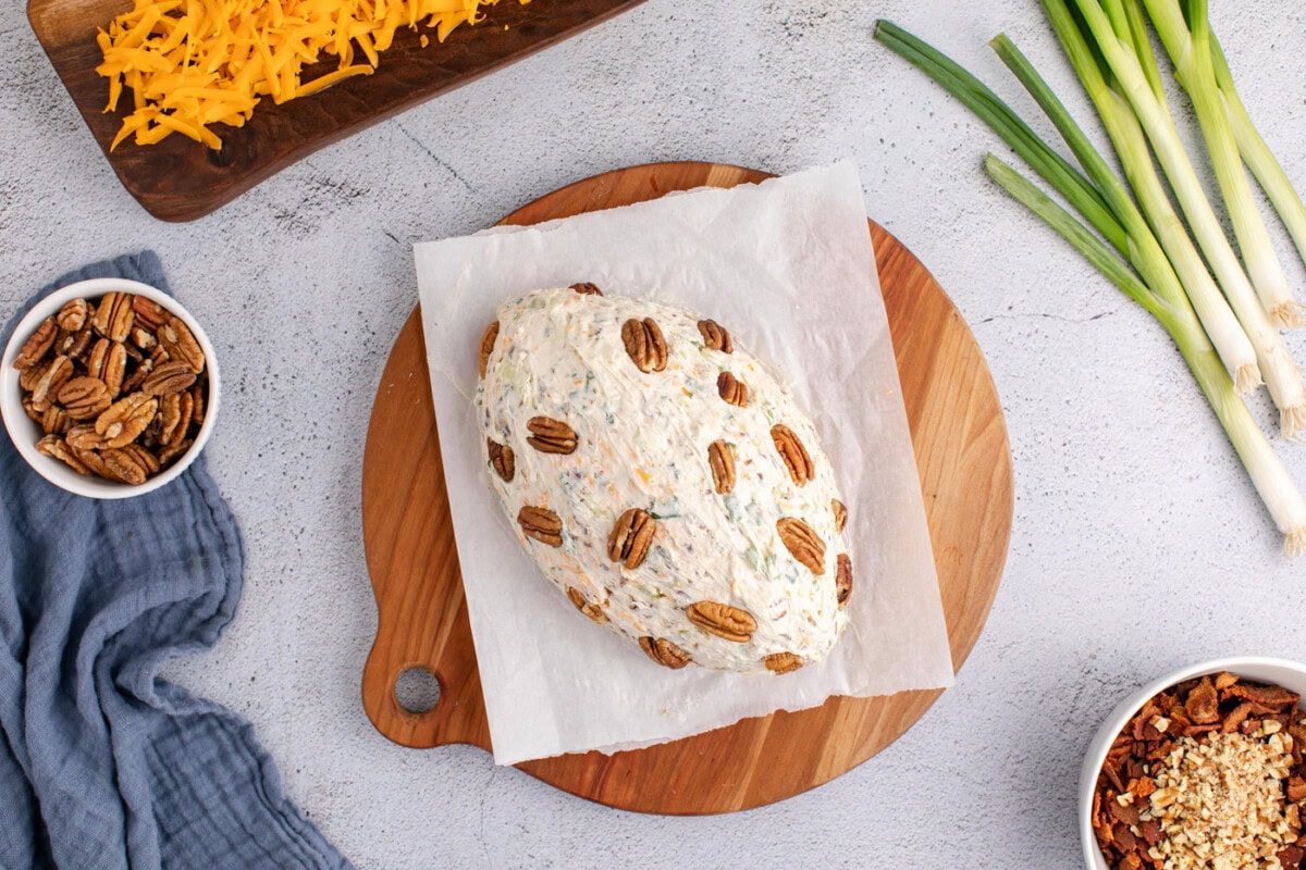 whole pecans added to football cheese ball