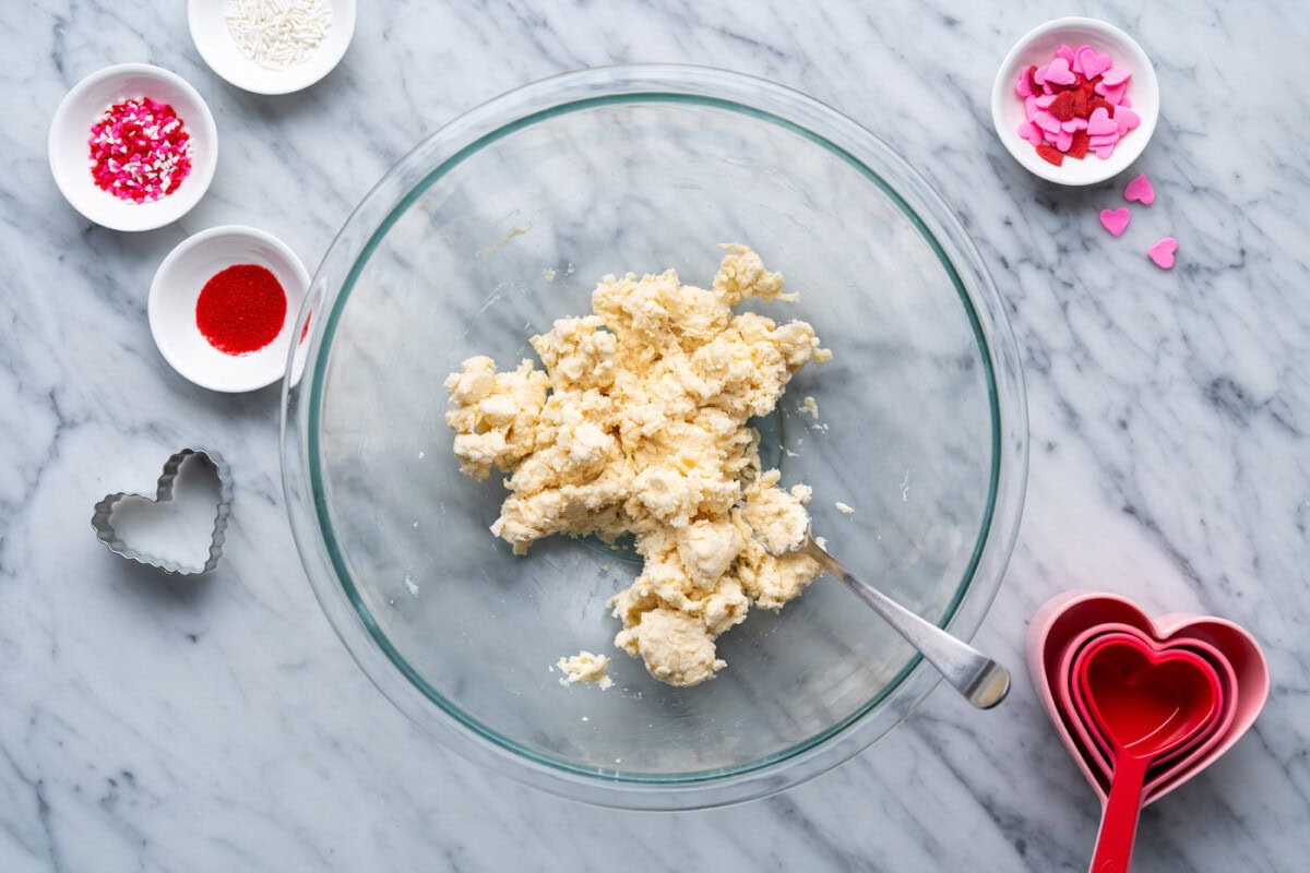cumbly pie dough in a bowl