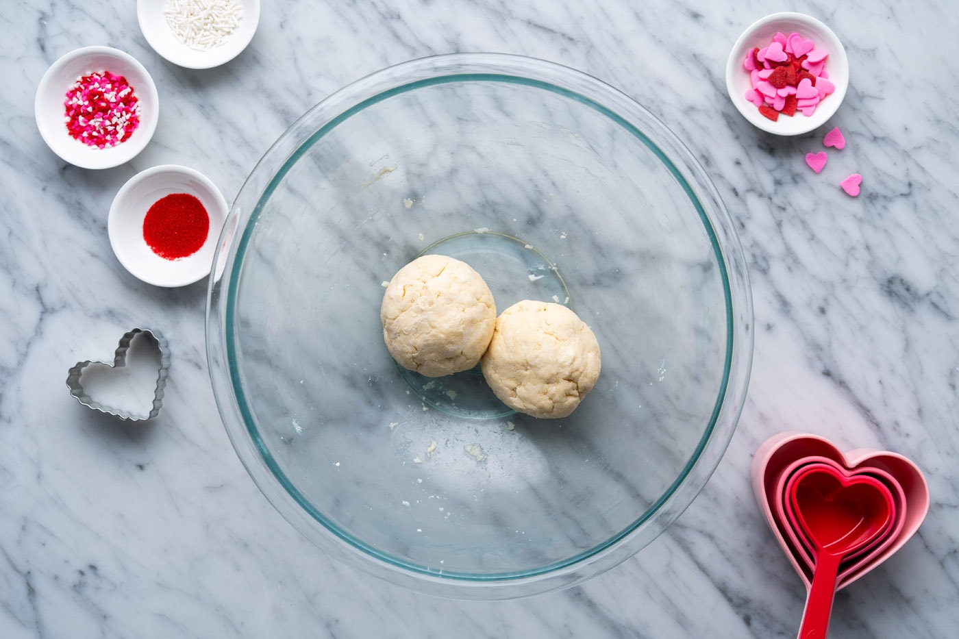 two pie dough balls in a bowl