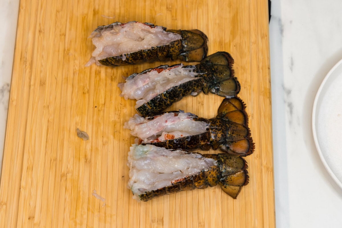 lobster meat poking out of opened shells