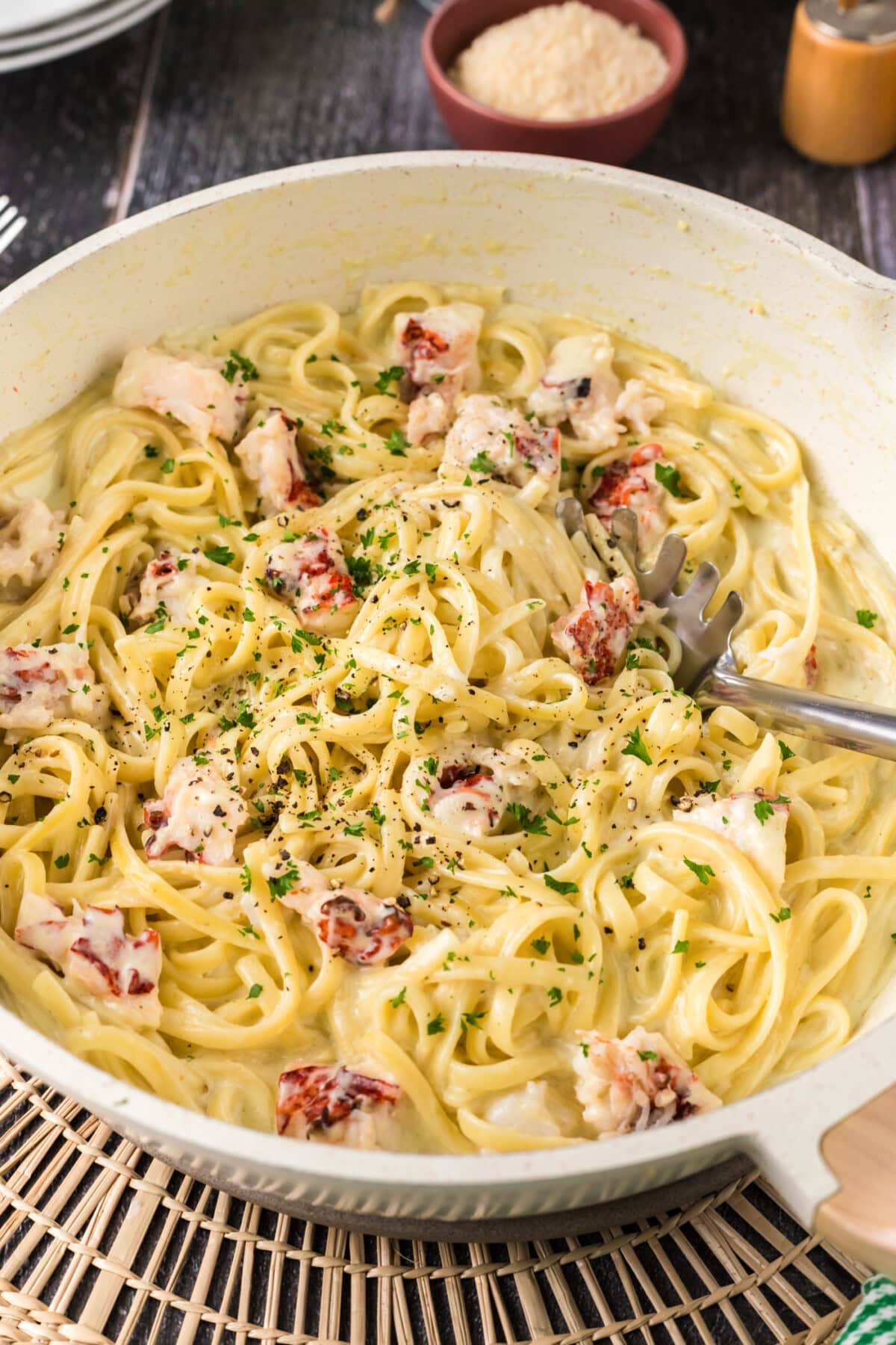 Lobster Pasta in a skillet with a spoon
