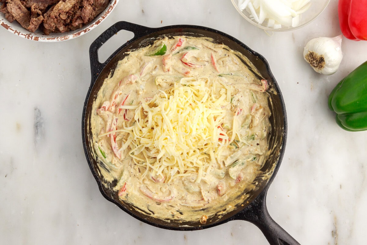 shredded cheese added to casserole ingredients