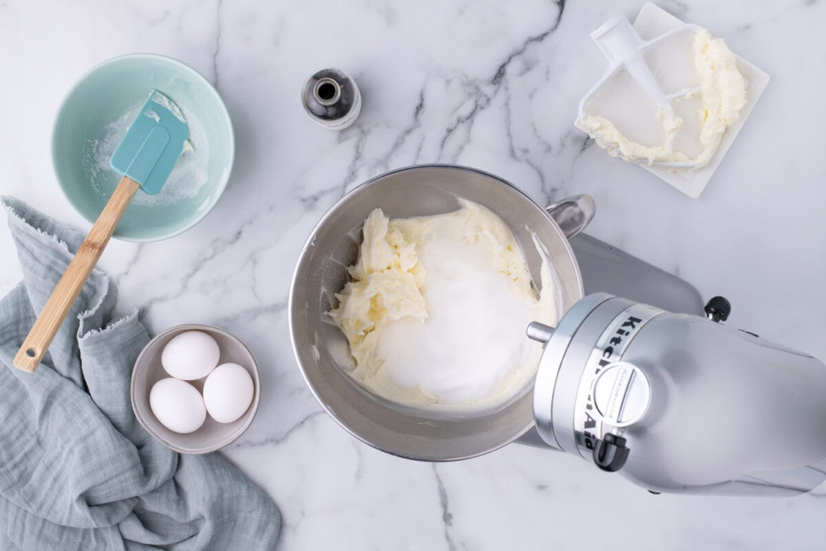 sugar added to creamed butter in a mixer bowl