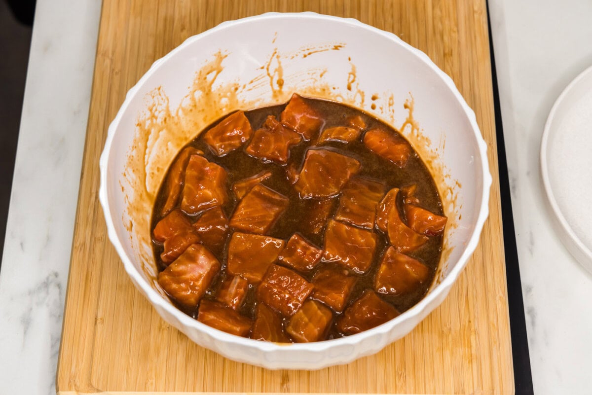 salmon bites marinating in a bowl