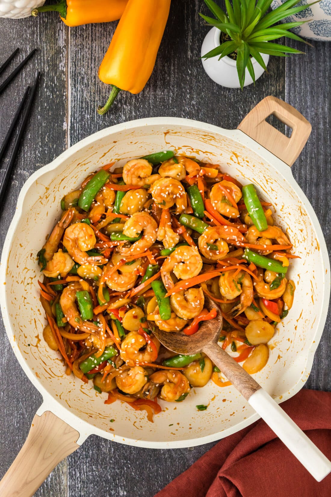 Shrimp Stir Fry in a skillet with a spoon