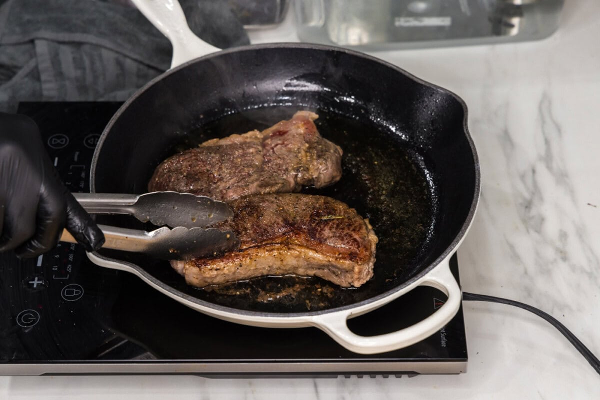 seared sous vide New York strip steaks
