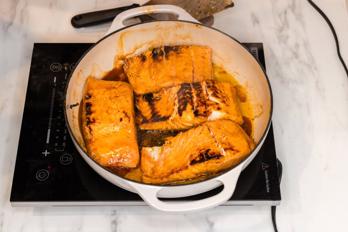 salmon filets in a skillet