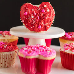 Valentine Heart Cupcake on a cupcake stand with more cupcakes around it