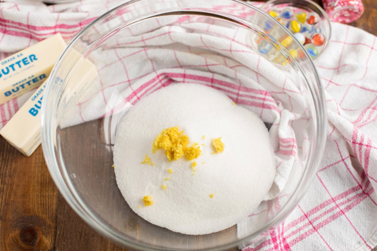 Sugar and lemon zest in a bowl
