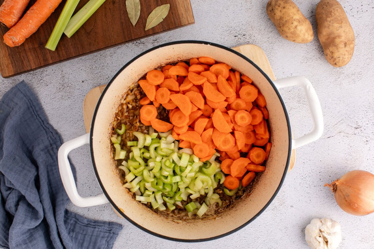 carrots and celery added to dutch oven