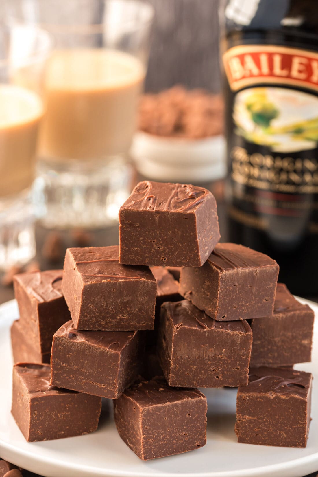 Close up photo of a stack of 4 Ingredient Baileys Fudge squares