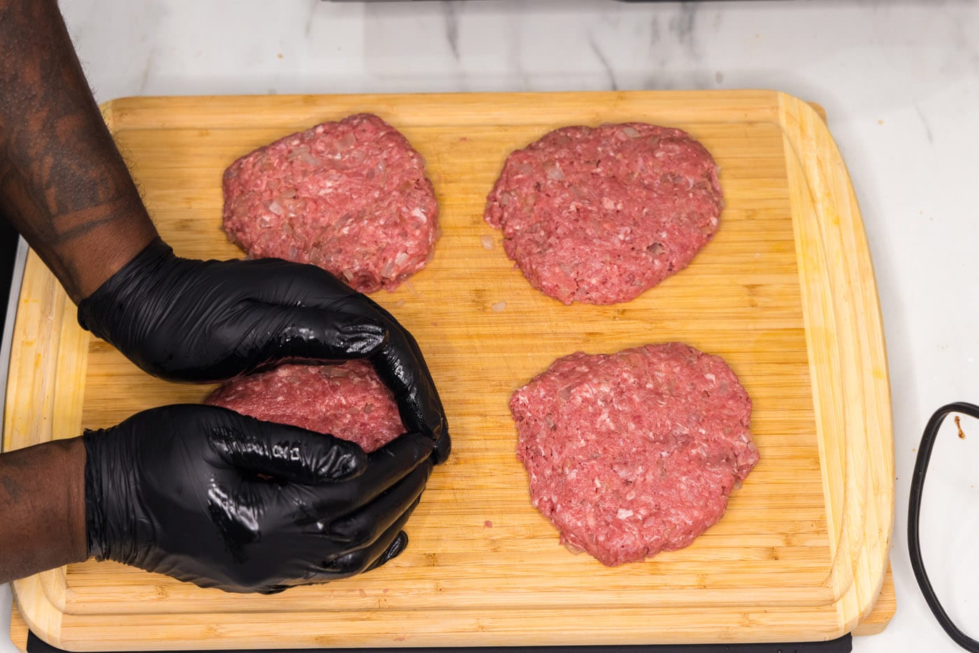 shaping ground beef into burger patties