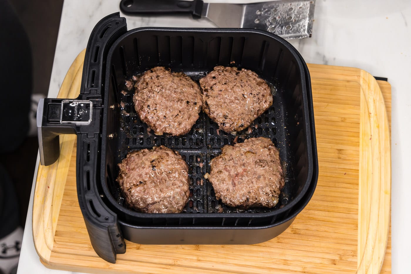 cooked burger patties in the air fryer
