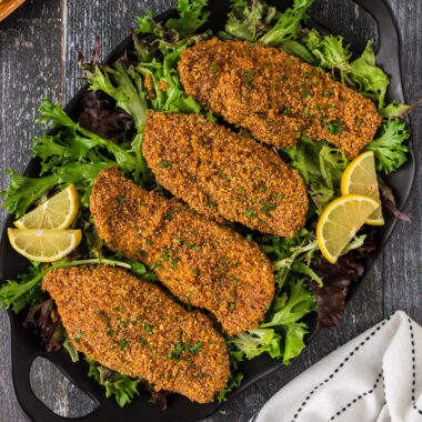 Almond Crusted Chicken breasts on a bed of lettuce
