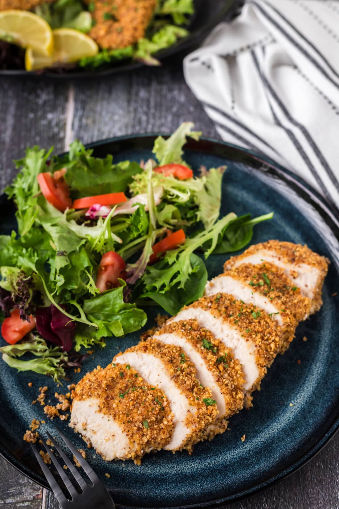 Almond Crusted Chicken on a plate cut into slices