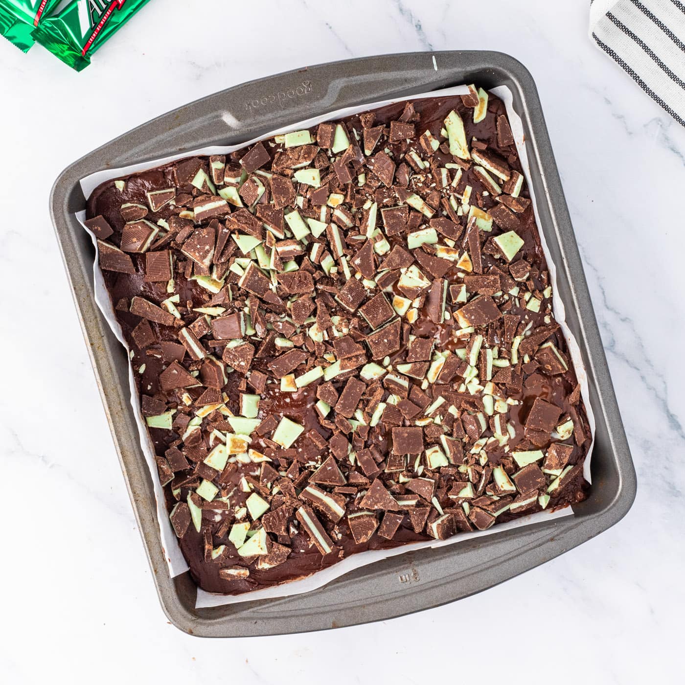 chopped chocolate mints on top of Andes mint fudge