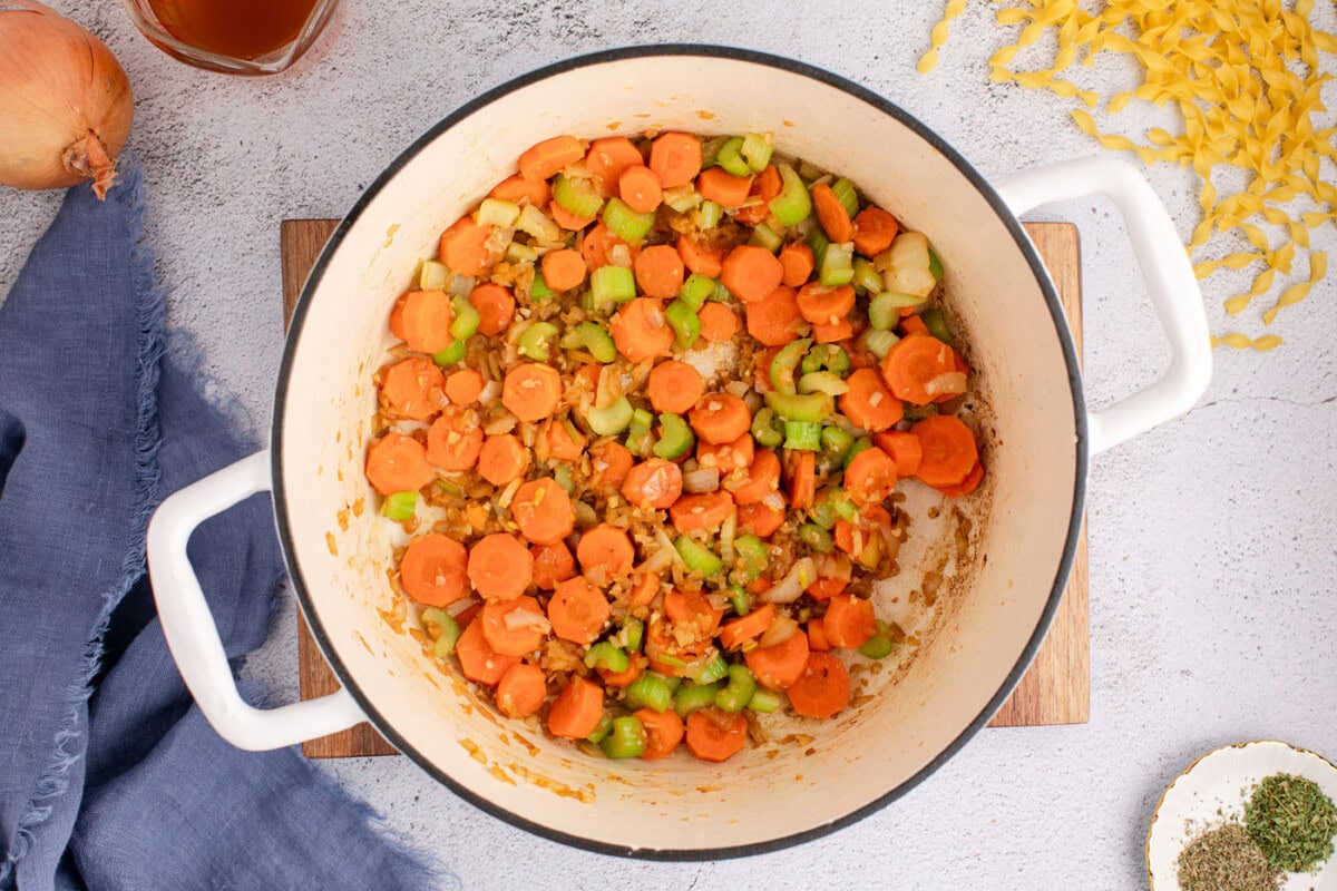 cooked carrots, onion, celery, and garlic in a dutch oven
