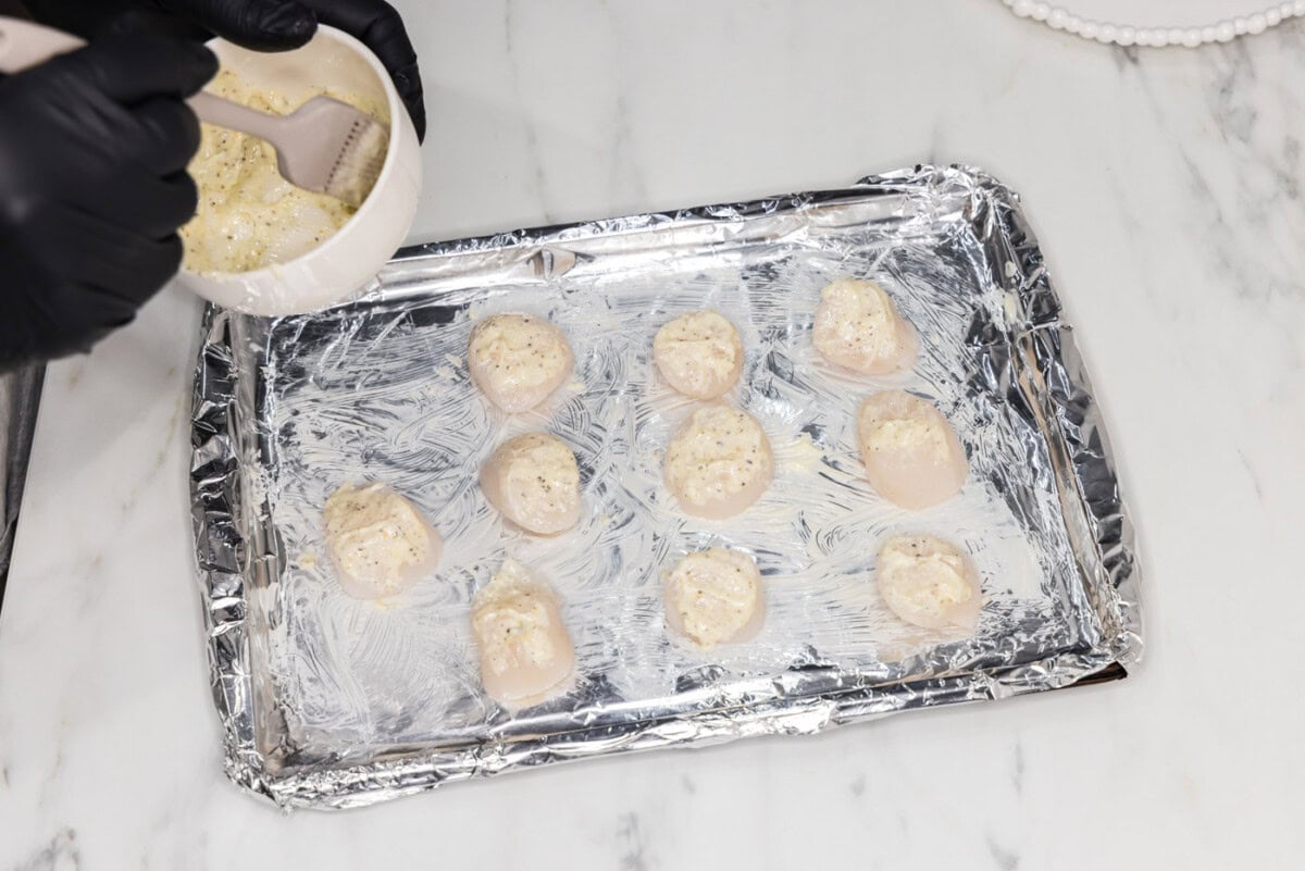 brushing scallops with softened butter mixture