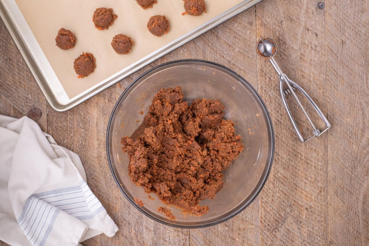 carrot cake and cream cheese frosting mixture in a bowl