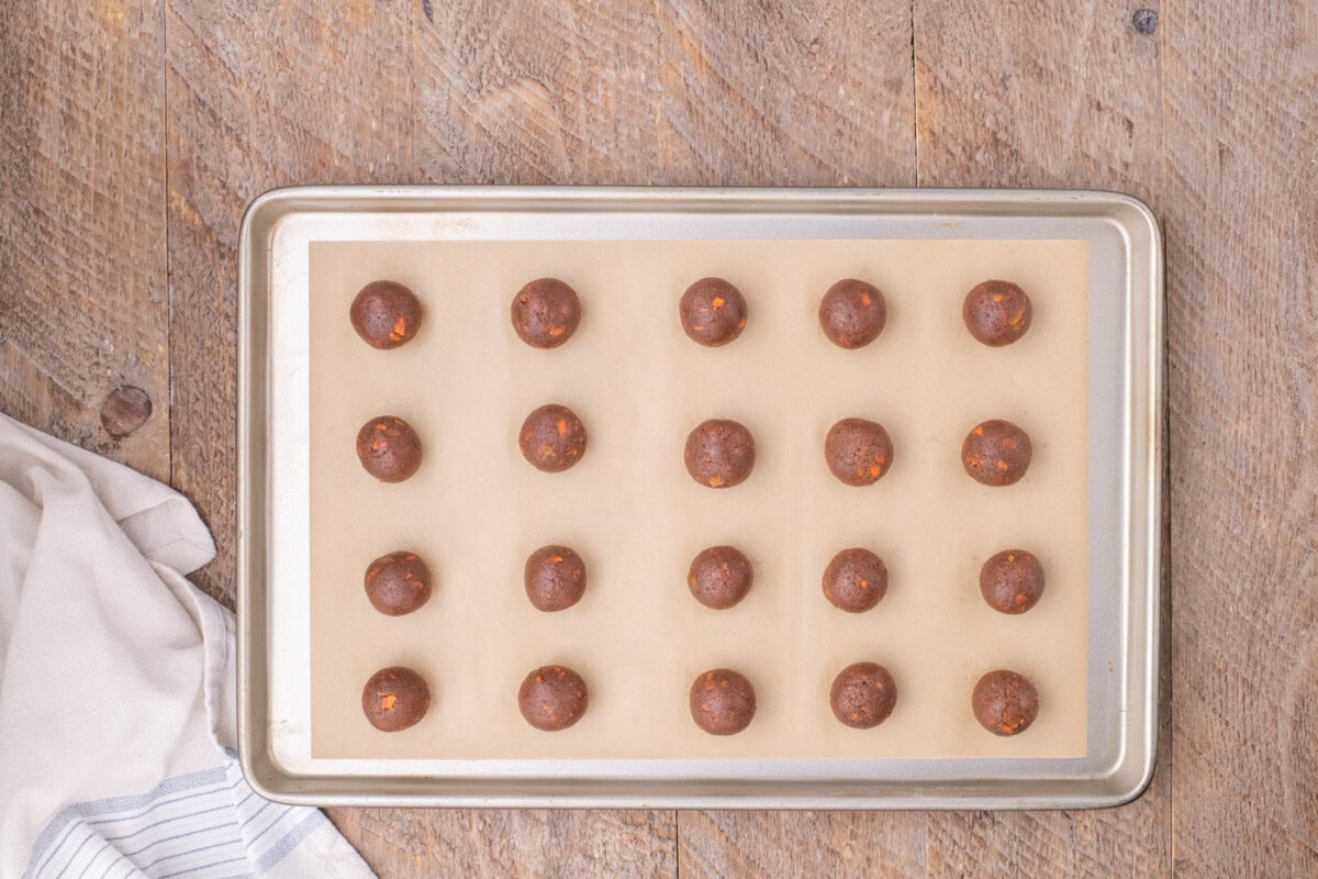 carrot cake balls on a baking sheet
