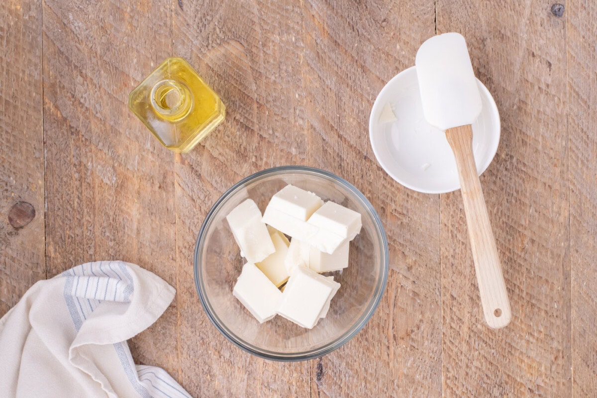 white almond bark squares in a bowl