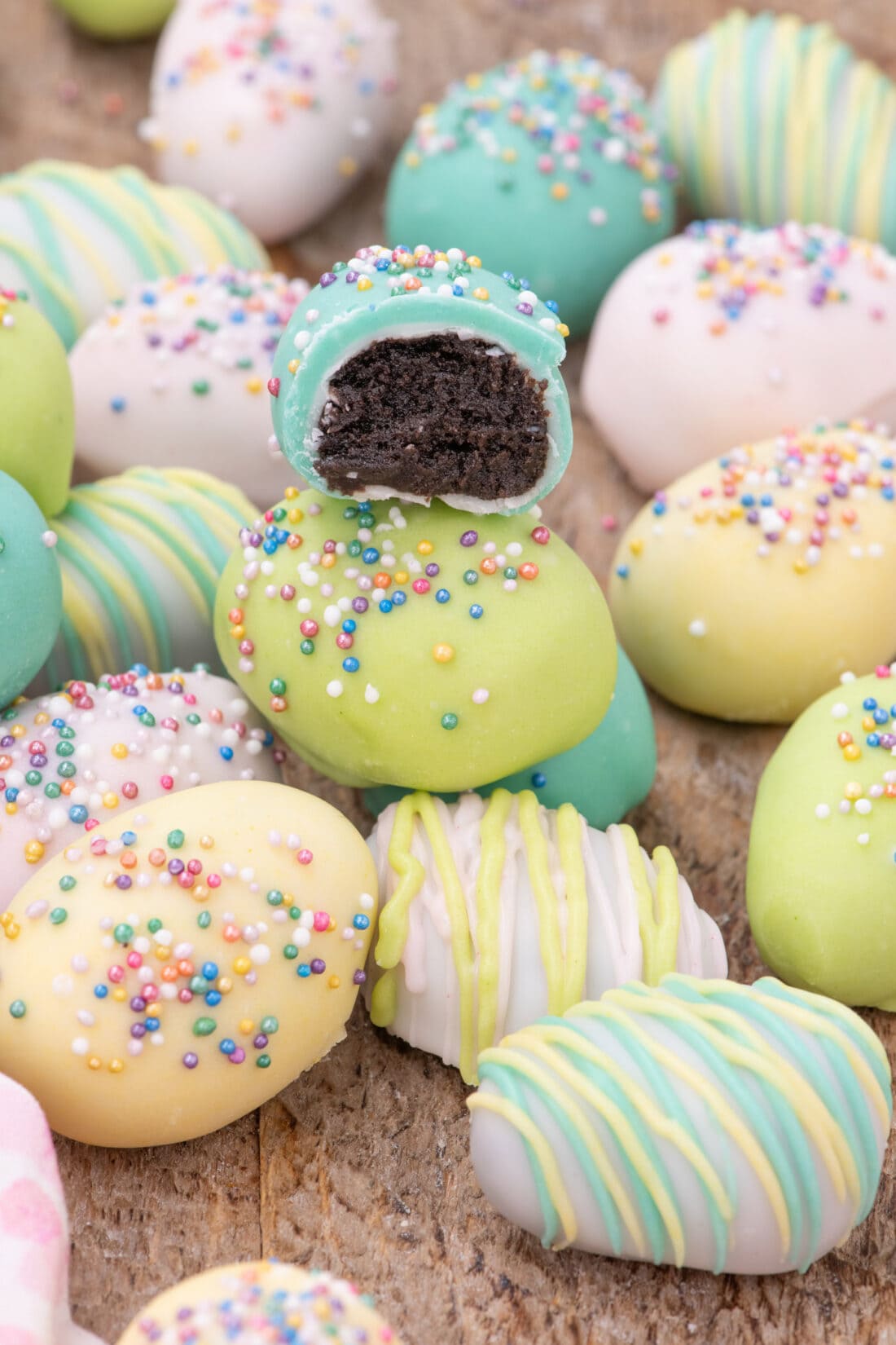 Easter Egg Oreo Truffles with a bite taken out of one