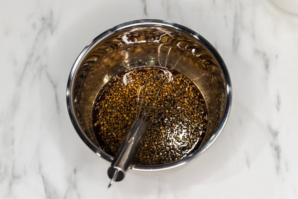 soy sauce, white wine vinegar, garlic, brown sugar, honey, and garlic salt whisked in a bowl