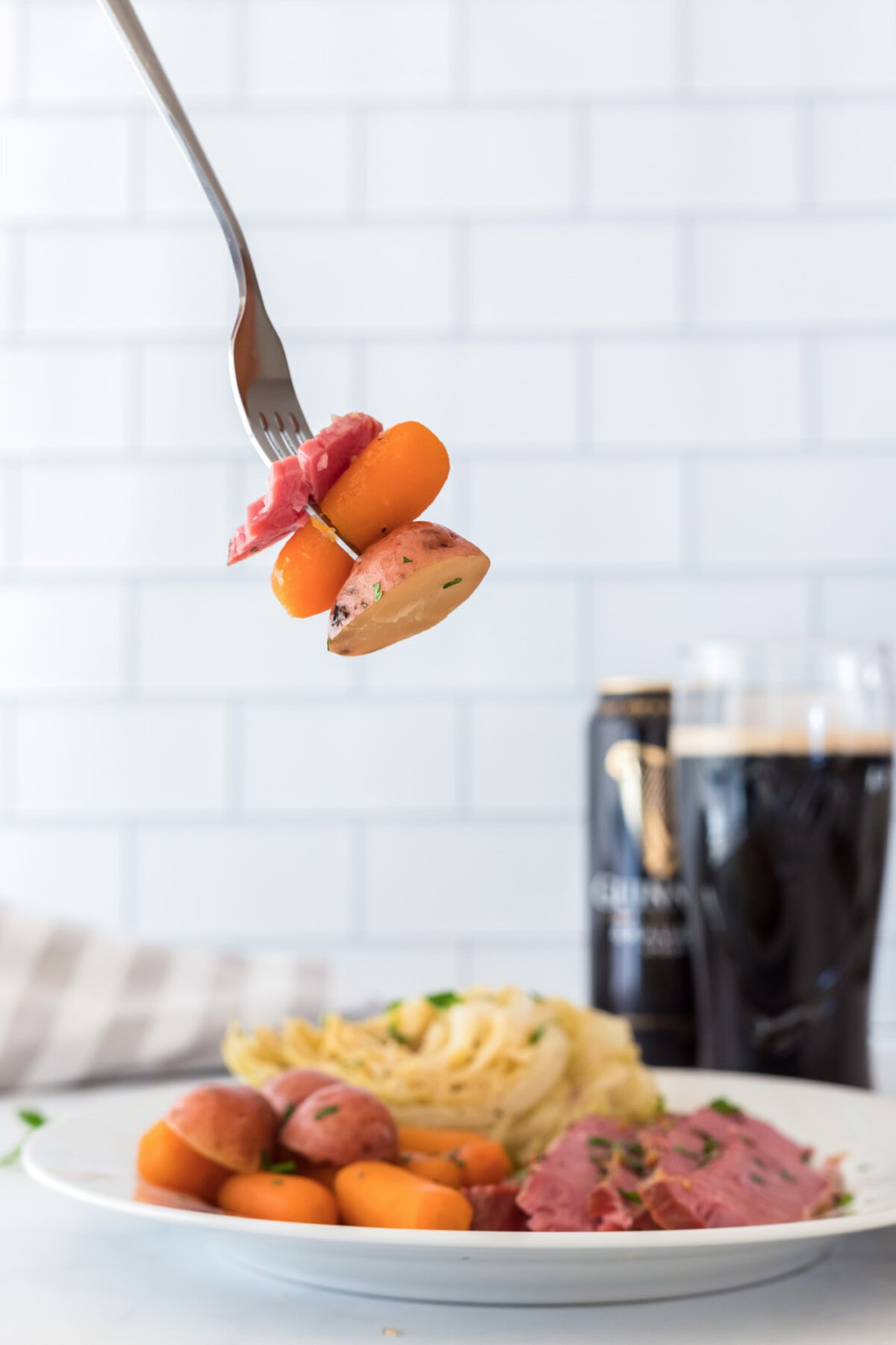 fork with corned beef and veggies