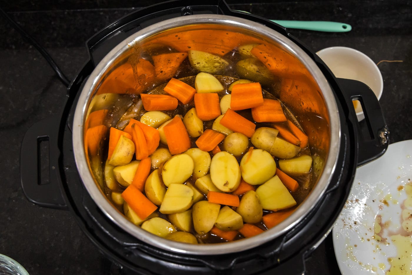 carrots and potatoes added to instant pot oxtail stew