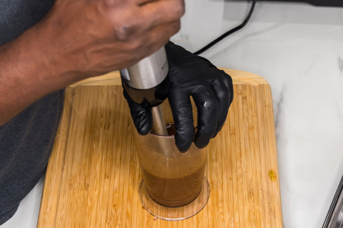 blitzing mushroom marinade with an immersion blender