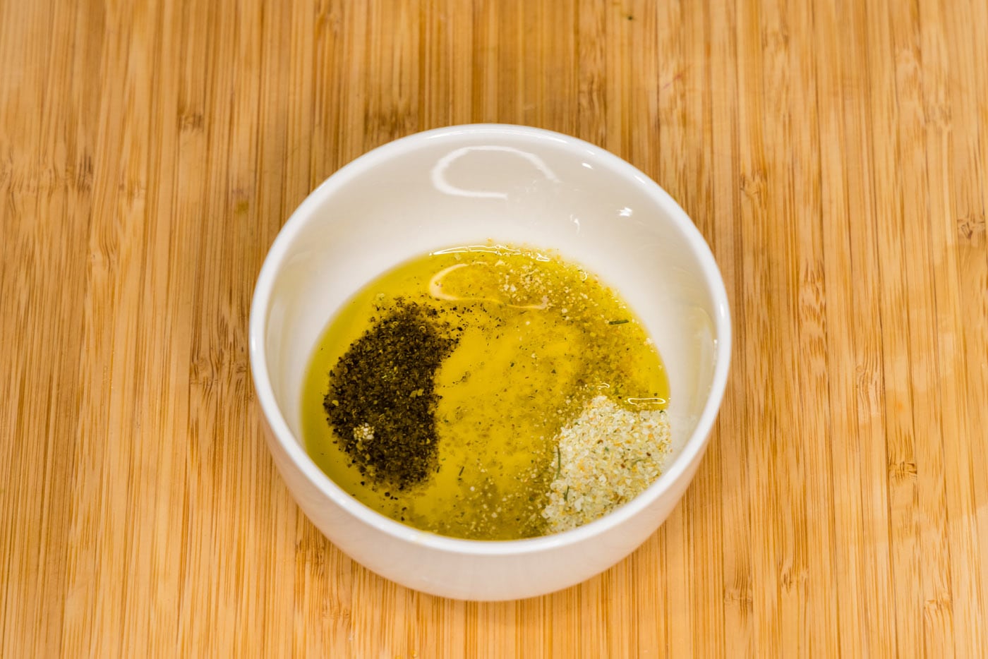 salt, pepper, and olive oil in a bowl
