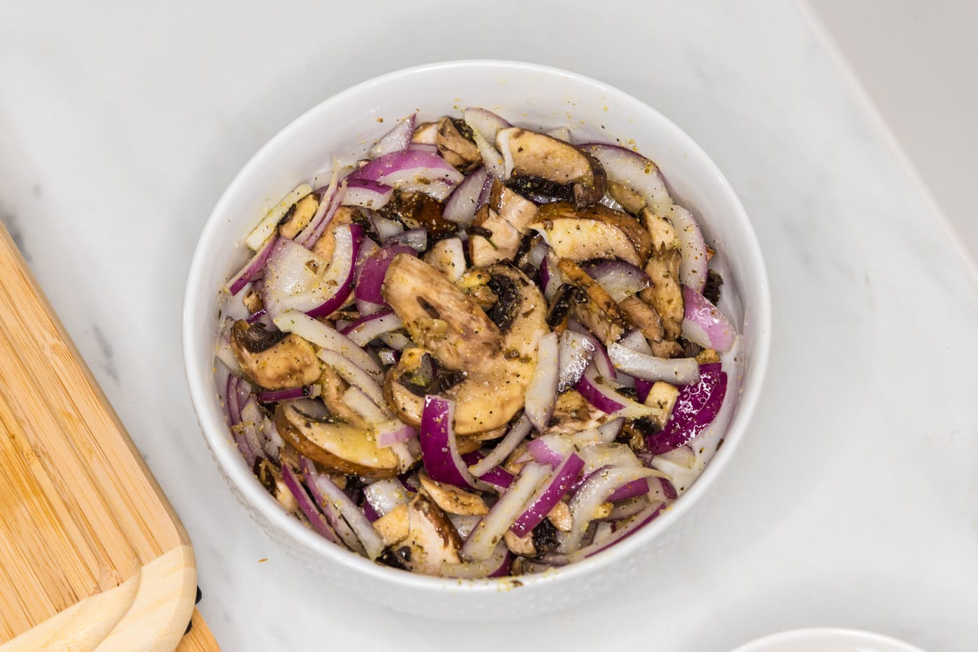 sliced mushrooms and red onion tossed with olive oil