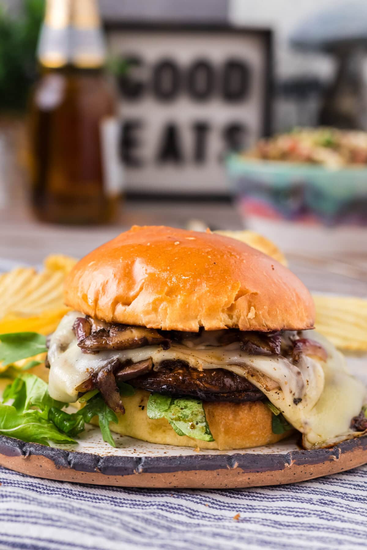 Mushroom Burger on a plate with potato chips