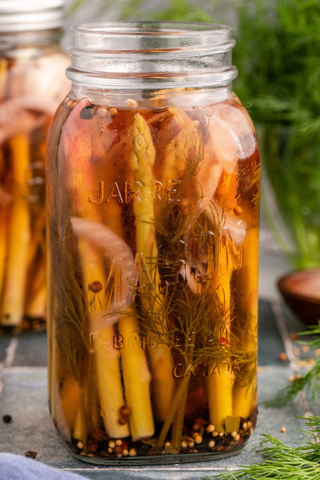 Close up photo of Pickled Asparagus in a mason jar