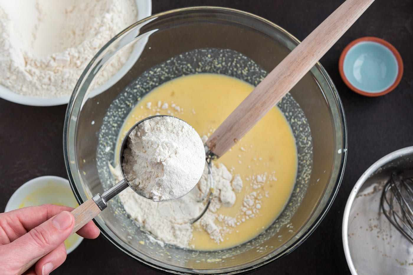 adding flour to active yeast mixture