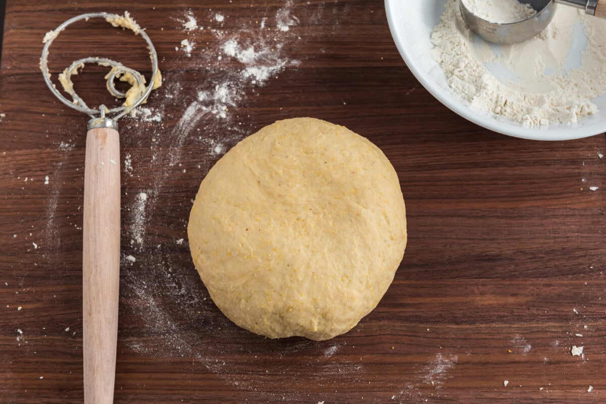dough ball on floured surface