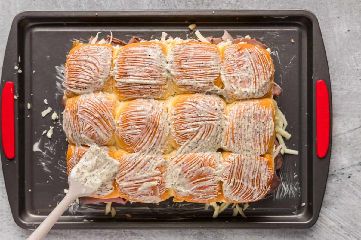 basting slider buns with garlic butter