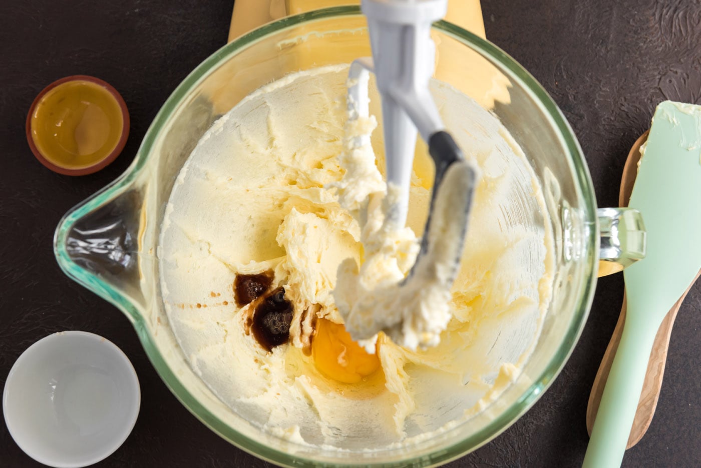 creamed butter, cream cheese, sugar, and vanilla in a bowl with egg