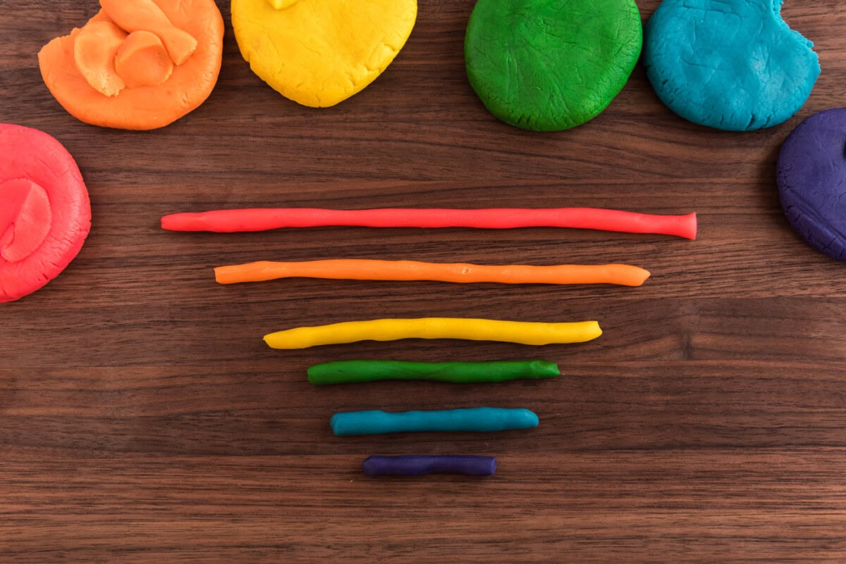 dough snakes in red, orange, yellow, green, blue, and indigo