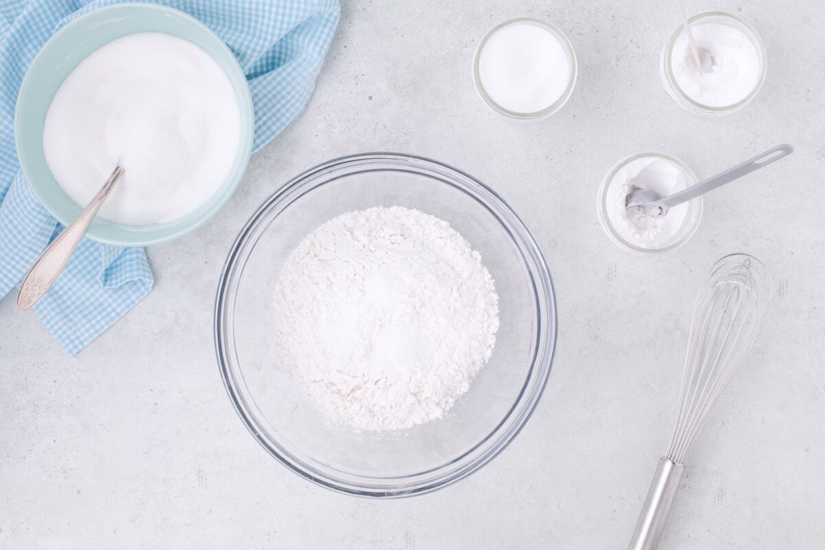 cake flour with sugar, baking powder, baking soda, and salt