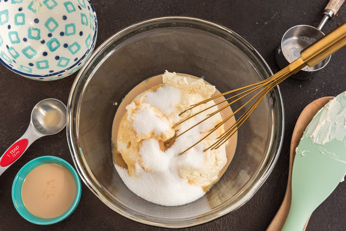 whisking mascarpone cheese with sugar and Bailey's